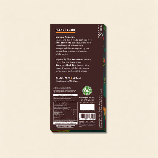 Thai Peanut Curry 70% Dark Chocolate, back packaging on a warm beige background.