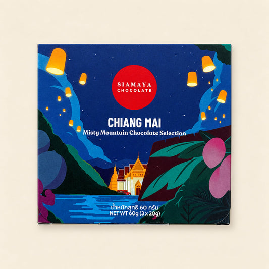 Chiang Mai gift set closed packaging, front view on a warm sand background.