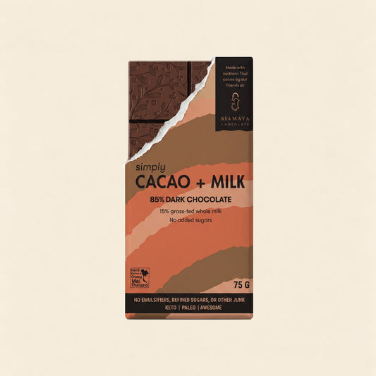 85% Simply Cacao Chocolate Milk, front packaging on a warm beige background.