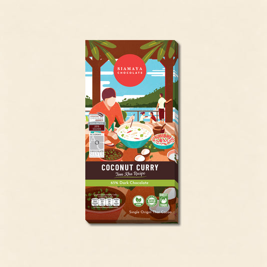 Thai Coconut Curry 65% Dark Chocolate, front packaging on a warm beige background.